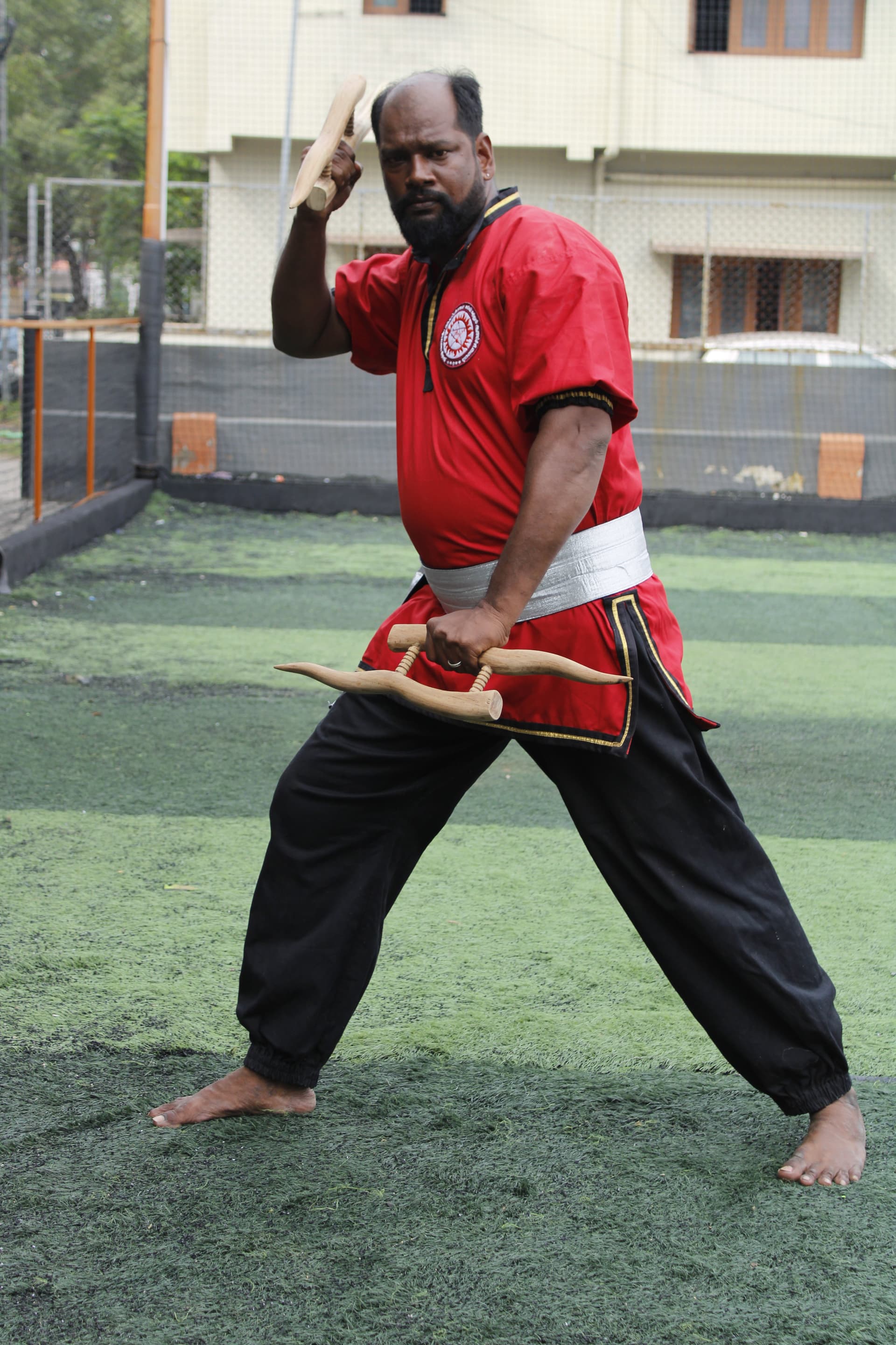 Portrait of Dr. N. Ramesh Aasaan - Founder, Master, and Chief Instructor of Tamil Traditional Martial Arts Centre with over 25 years of teaching experience