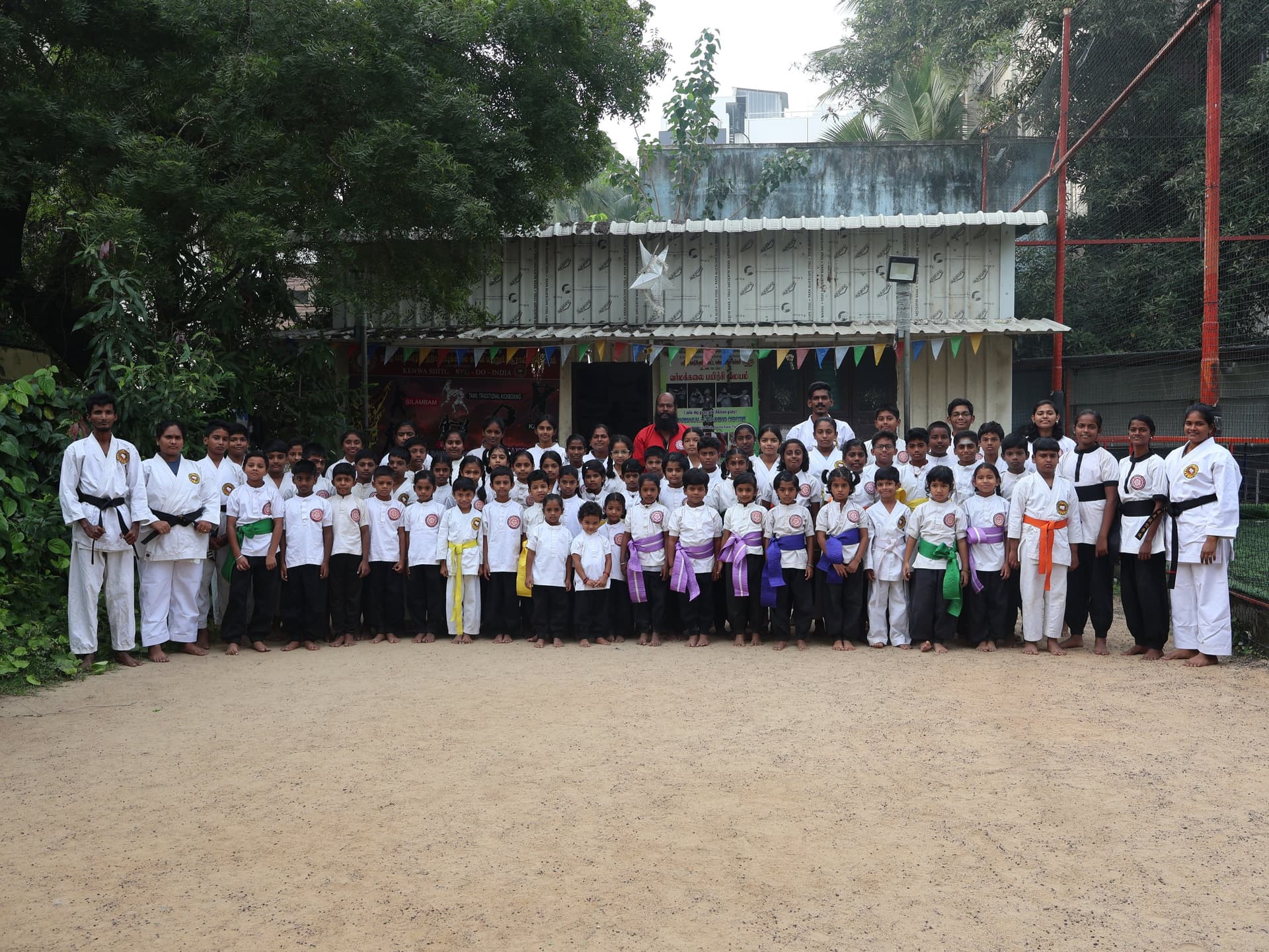 Silambam students participating in formal belt grading examination ceremony