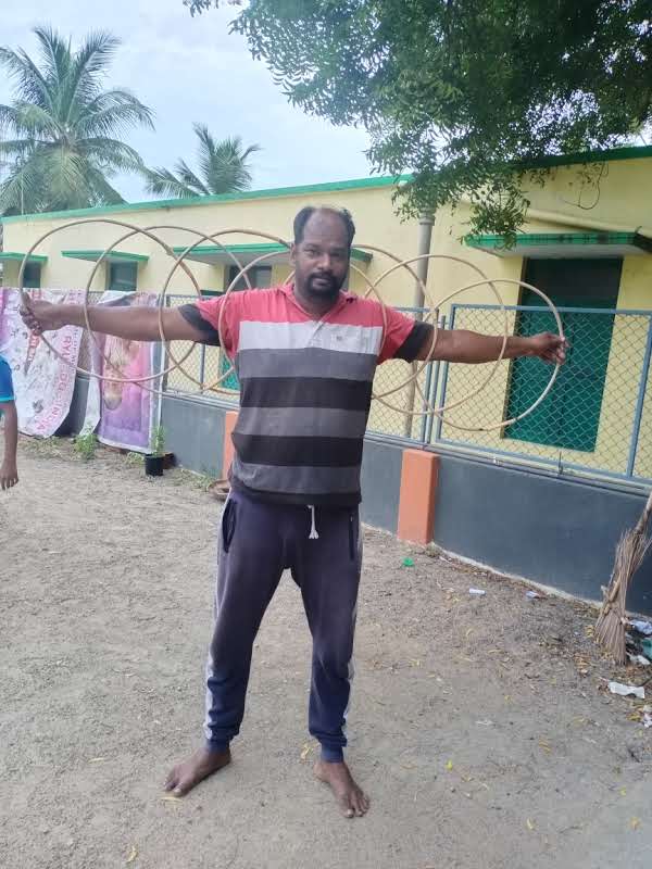 Dr. Ramesh Aasaan demonstrating traditional Indian martial arts weapon rings technique